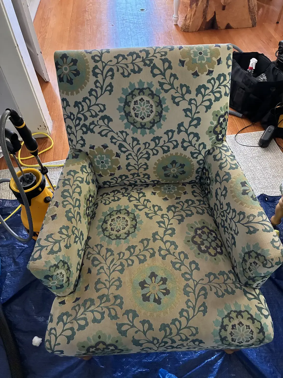 Patterned accent armchair during upholstery extraction by KC Pro Cleaning
