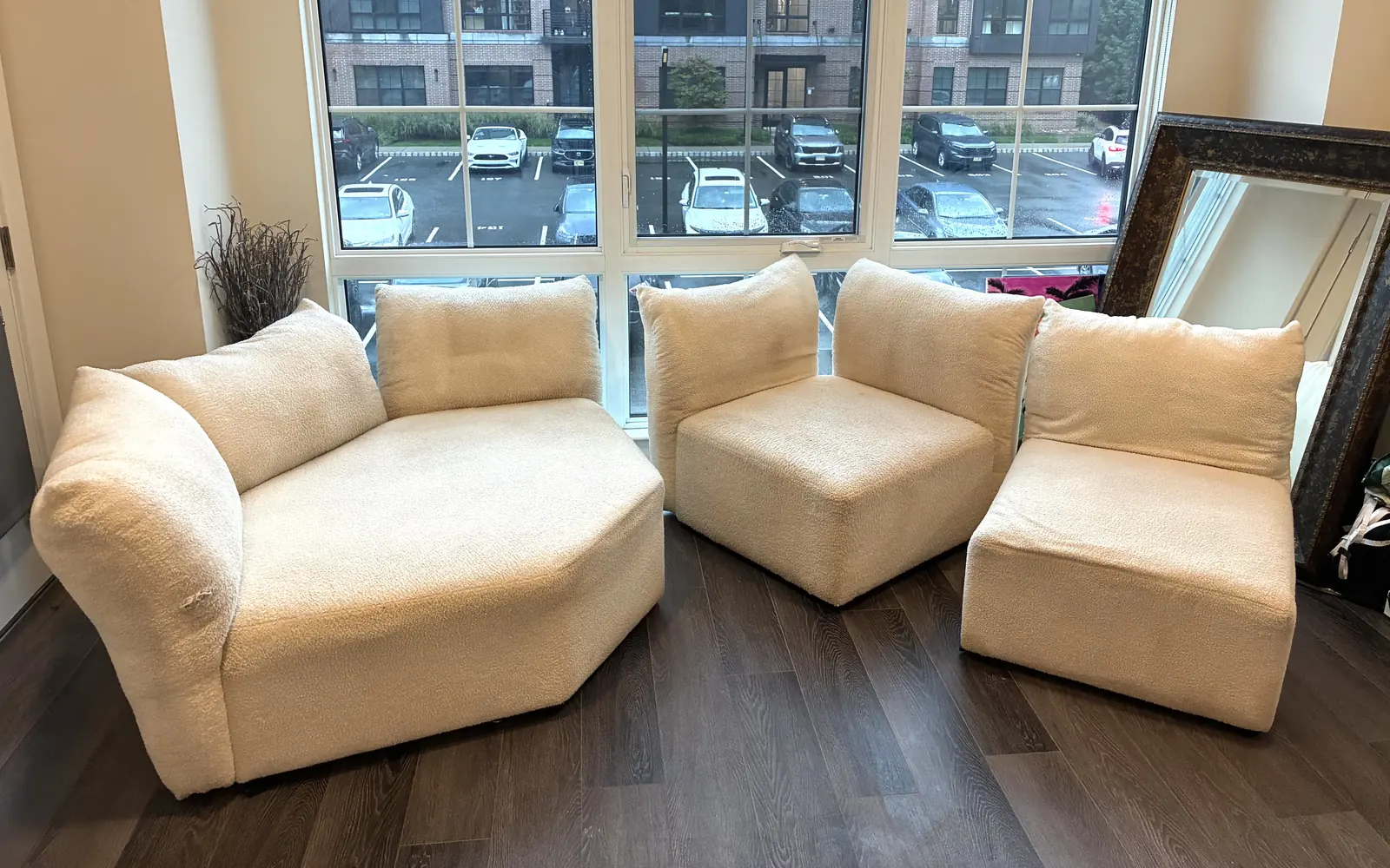 Cream bouclé modular sofa set photographed on site by KC Pro Cleaning