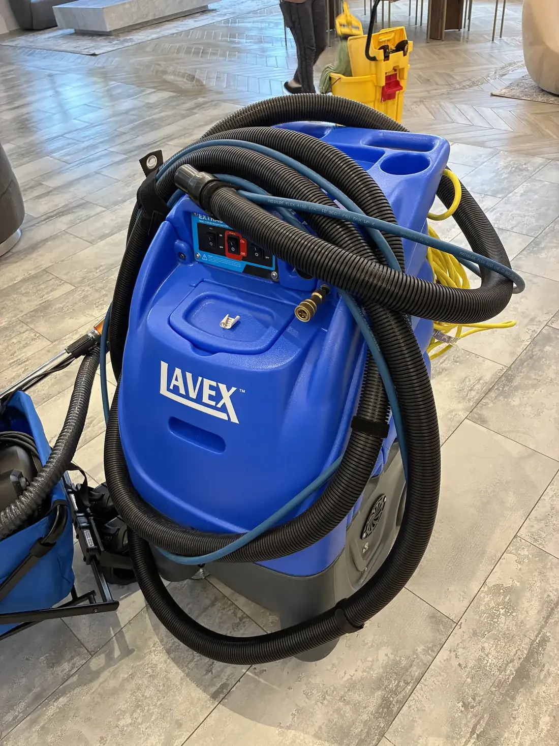 KC Pro Cleaning professional carpet extractor set up in a tiled room