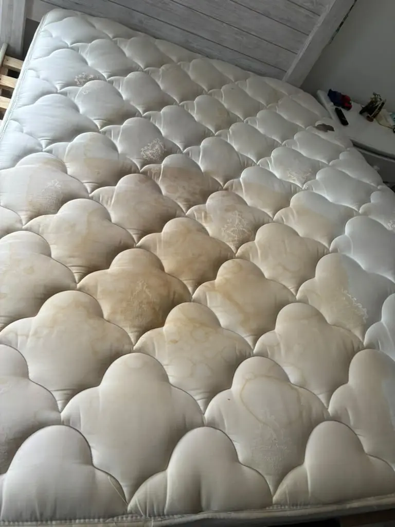 Mattress before professional cleaning by KC Pro Cleaning